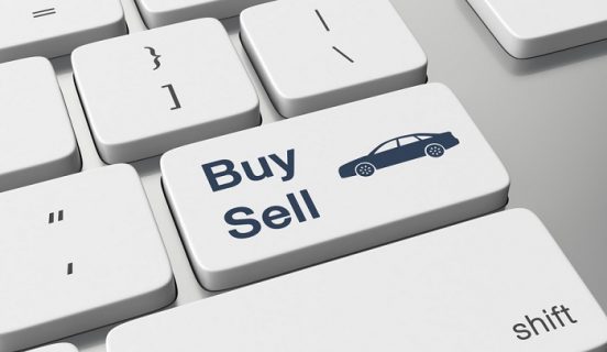 Buying or selling car online keyboard concept